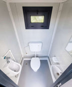 Sanitärcontainer mit Dusche, WC und Urinal